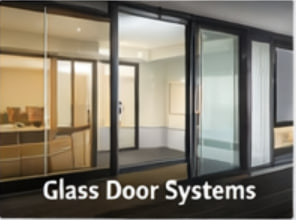 Brush seals for glass door systems